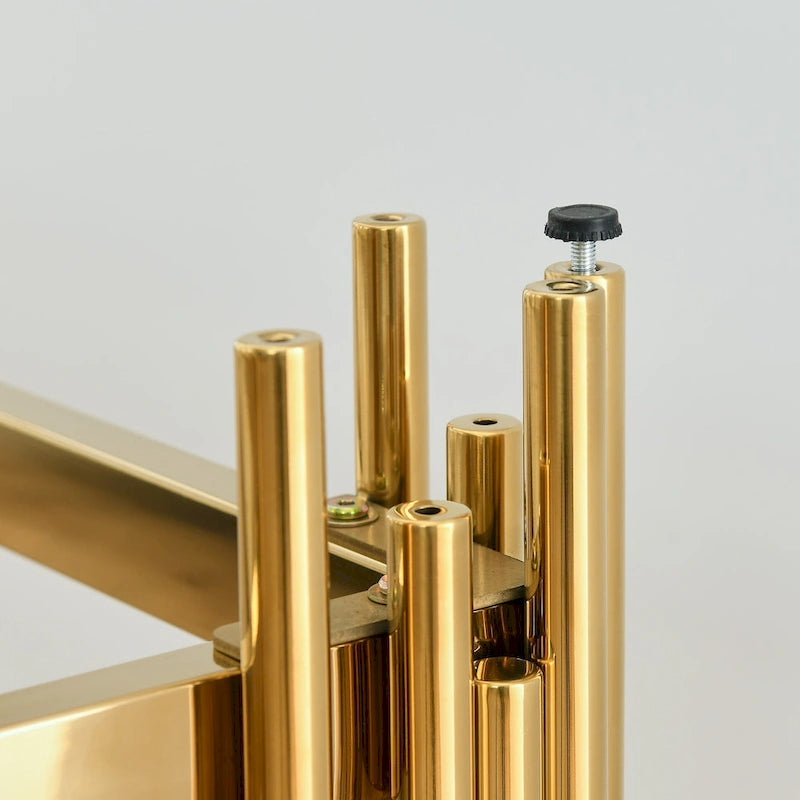 Console étroite à deux niveaux avec structure en métal finition dorée et plateau en verre trempé