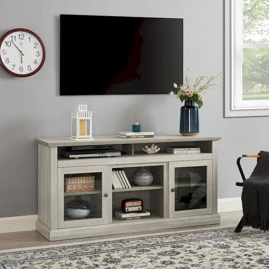 Meuble TV gris pierre 60 pouces avec gestion des câbles, portes vitrées et étagères réglables pour téléviseurs jusqu'à 65 pouces.