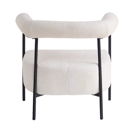 Fauteuil d'appoint moderne en tissu bouclé, avec accoudoirs incurvés et structure en métal noir.