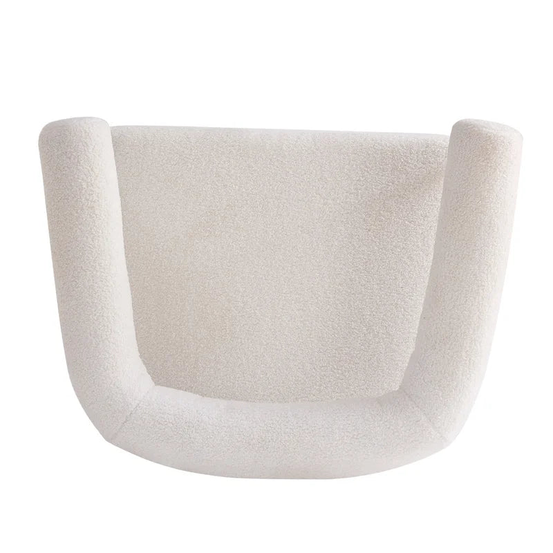 Fauteuil d'appoint moderne en tissu bouclé, avec accoudoirs incurvés et structure en métal noir.