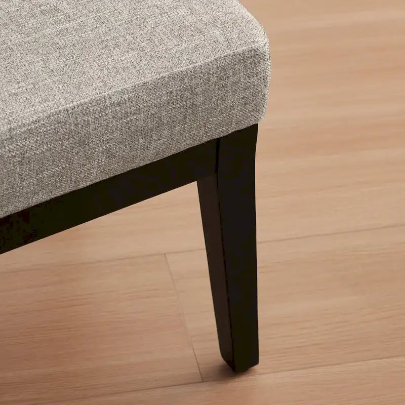 Fauteuil rembourré de style Mid-Century 27,7 avec structure en bois massif et repose-pieds.