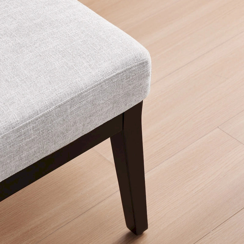 Fauteuil rembourré de style Mid-Century 27,7 avec structure en bois massif et repose-pieds.