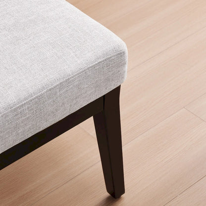 Fauteuil rembourré de style Mid-Century 27,7 avec structure en bois massif et repose-pieds.