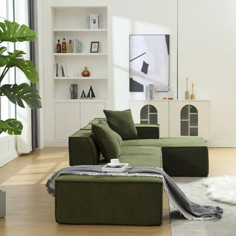 Canapé d'angle modulable minimaliste vert 129,5 cm en forme de L, 4 places avec méridienne, design modulable et polyvalent.
