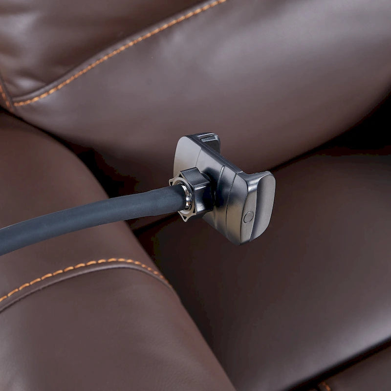Fauteuil inclinable électrique noir, avec massage, chauffage, ports USB, support pour téléphone et poches latérales, inclinaison réglable jusqu'à 139°.