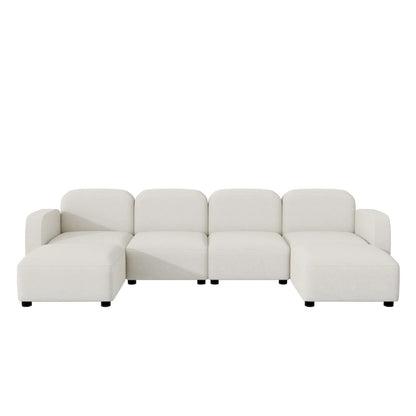 Canapé d'angle modulable en velours en forme de U, 6 places, avec deux poufs, design réversible pour un espace de vie personnalisable.