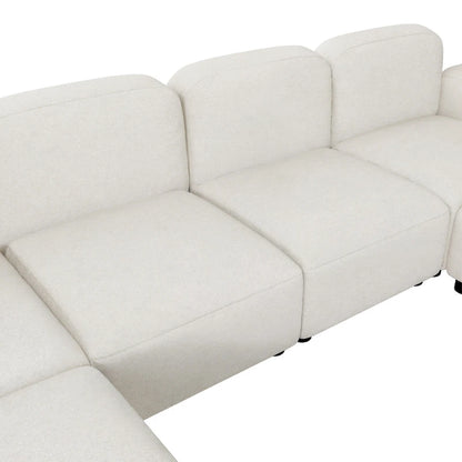 Canapé d'angle modulable en velours en forme de U, 6 places, avec deux poufs, design réversible pour un espace de vie personnalisable.