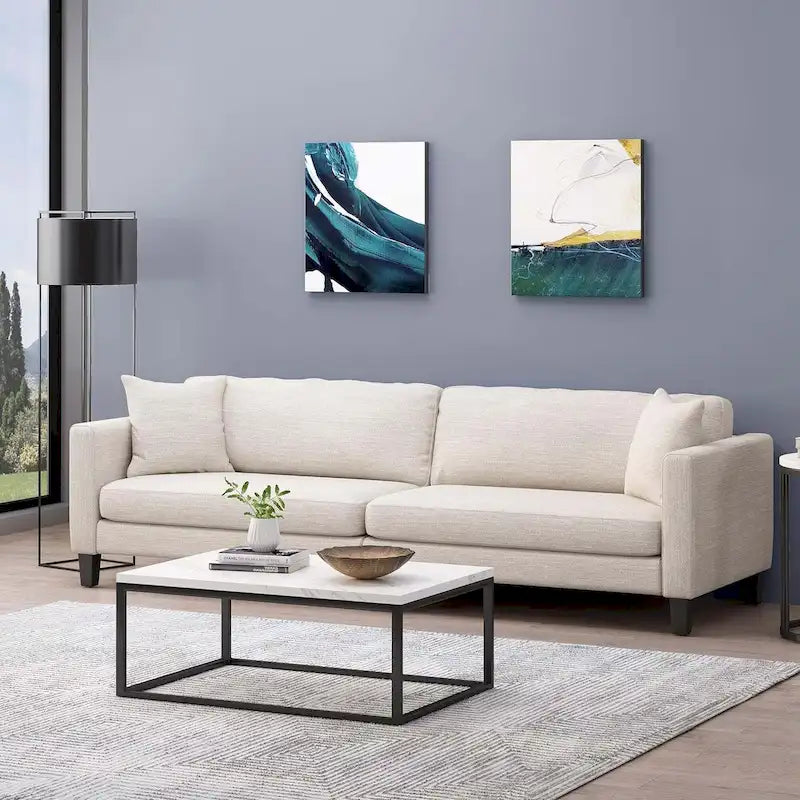 Canapé 3 places beige moderne 101 avec pieds en bois et deux coussins pour salon