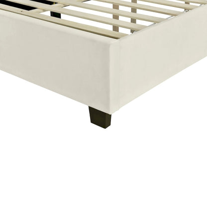 Lit plateforme moderne recouvert de velours avec grande tête de lit