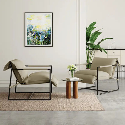 Ensemble de 2 fauteuils d'appoint en tissu avec structure en métal et dossier suspendu.