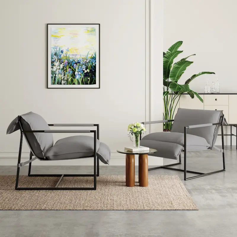 Ensemble de 2 fauteuils d'appoint en tissu avec structure en métal et dossier suspendu.