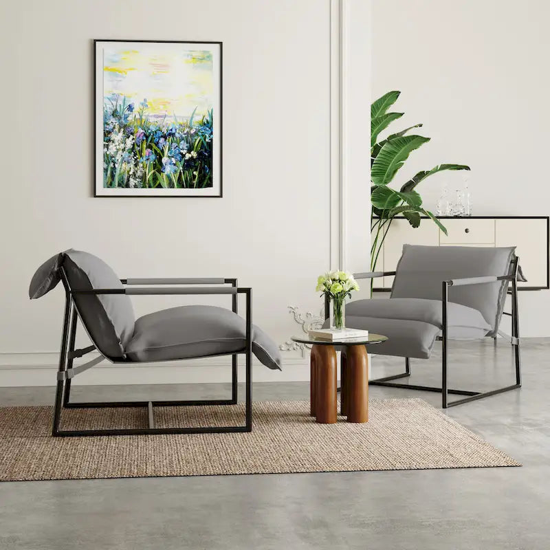 Ensemble de 2 fauteuils d'appoint en tissu avec structure en métal et dossier suspendu.