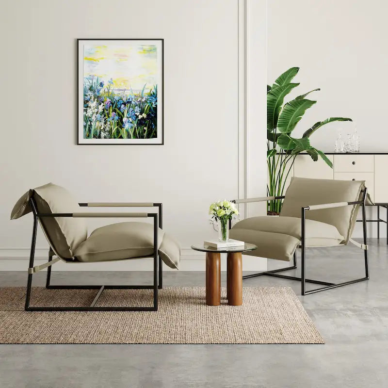 Ensemble de 2 fauteuils d'appoint en tissu avec structure en métal et dossier suspendu.