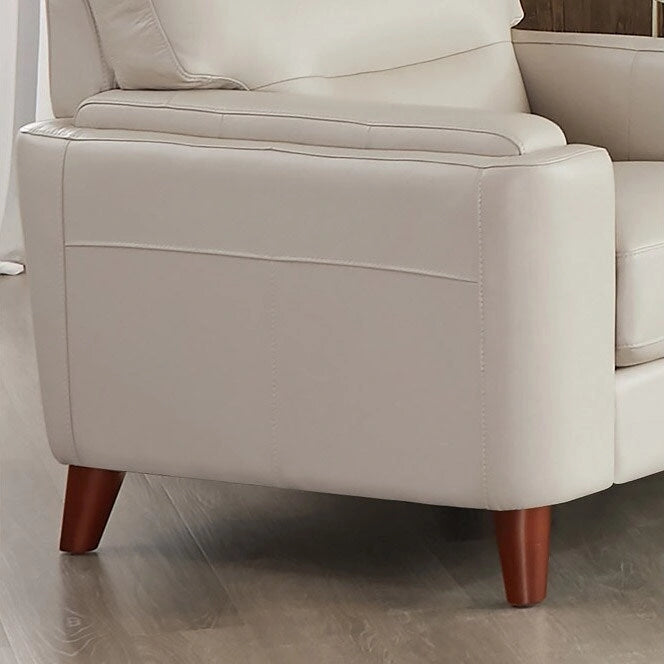 Fauteuil Hydeline Elm en cuir pleine fleur avec plumes, mousse à mémoire de forme et ressorts