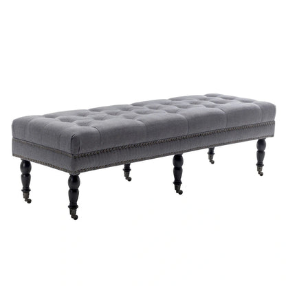 Banc d'appoint en tissu Juna de Porthos Home avec pieds et roulettes en bois d'hévéa
