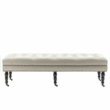 Banc d'appoint en tissu Juna de Porthos Home avec pieds et roulettes en bois d'hévéa
