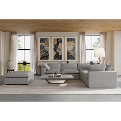 Canapé d'angle modulable Cloud, 6 places, avec coussins et pouf.