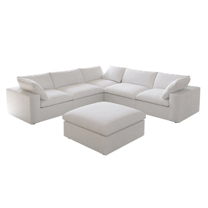 Canapé d'angle modulable Cloud, 6 places, avec coussins et pouf.
