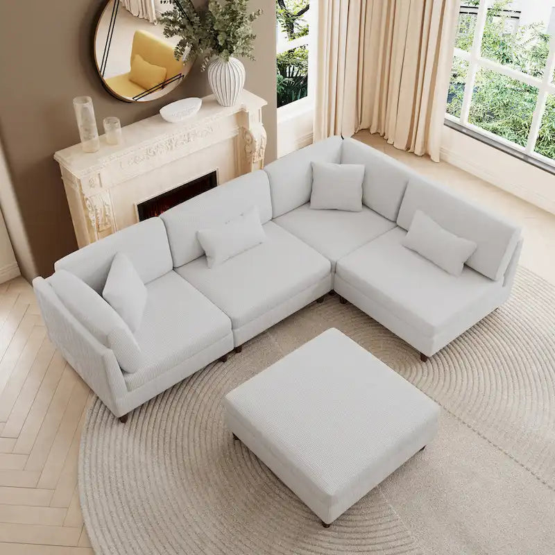 Canapé d'angle convertible en velours côtelé avec pouf